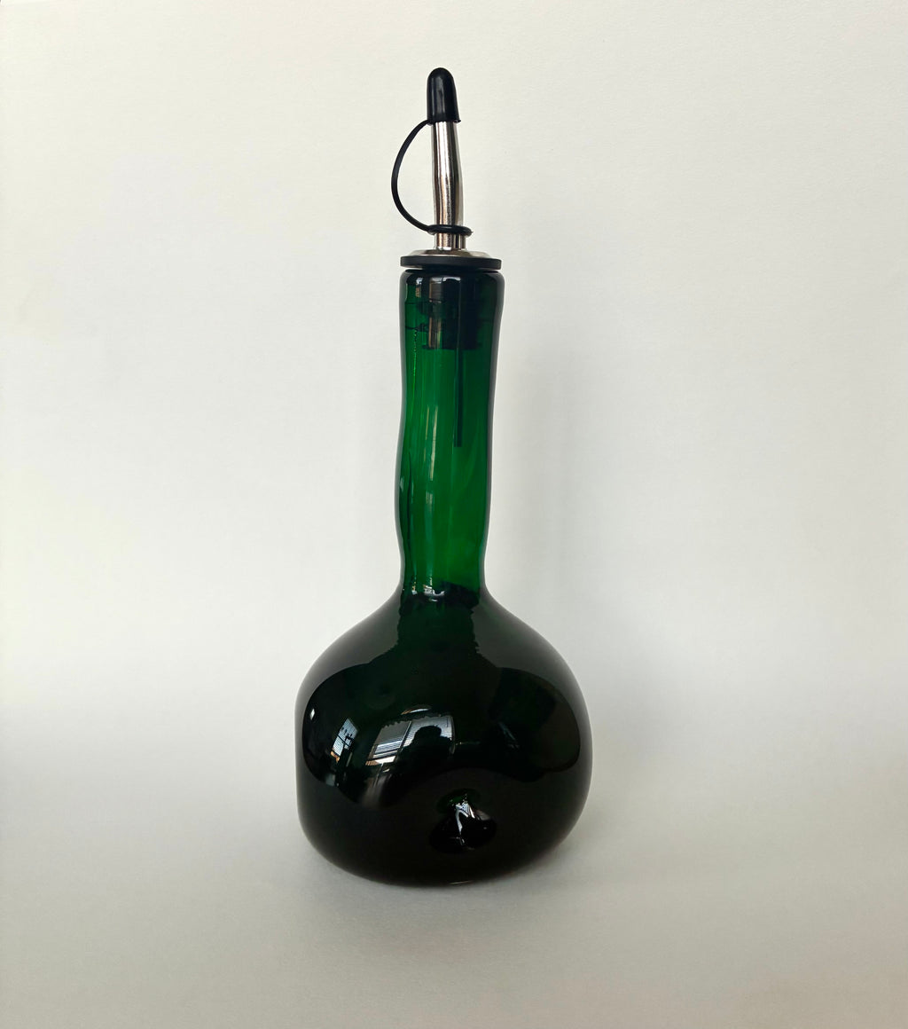 Emerald dimpled oil bottle