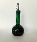 Emerald dimpled oil bottle