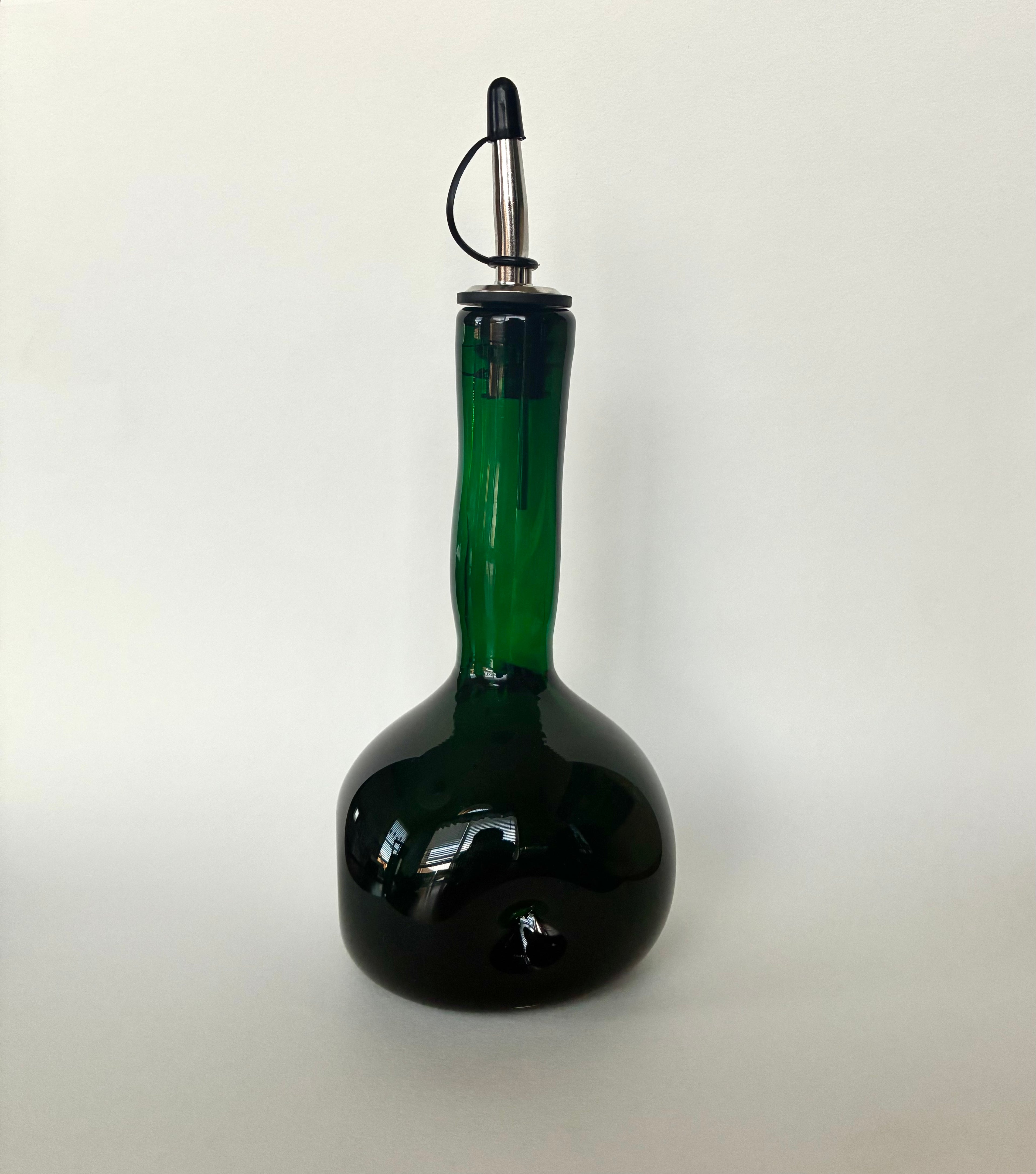 Emerald dimpled oil bottle
