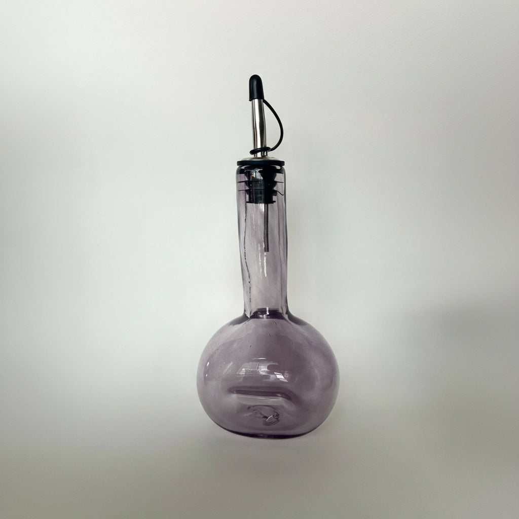 Dented oil bottle -amethyst