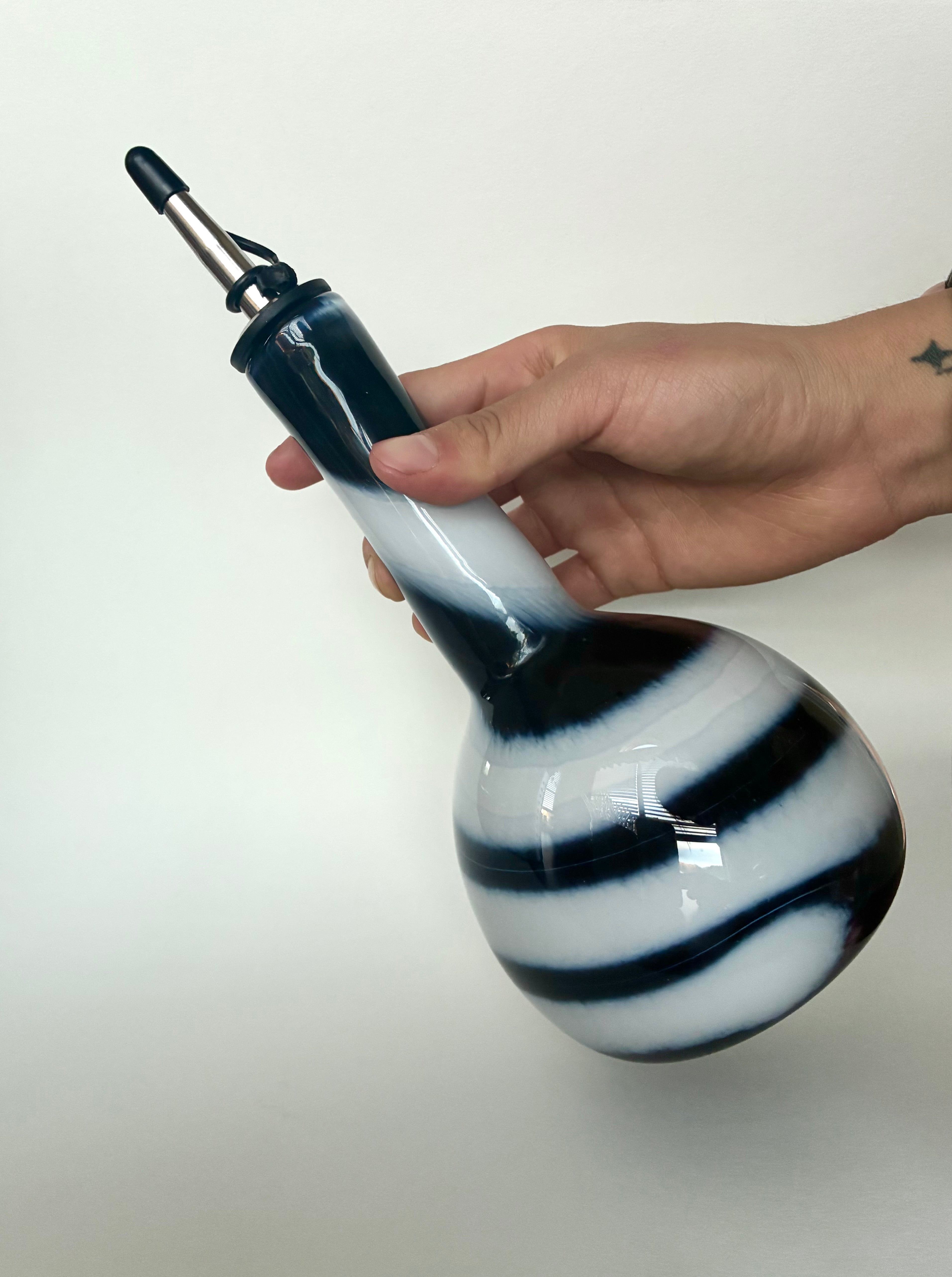 Spiral oil bottle