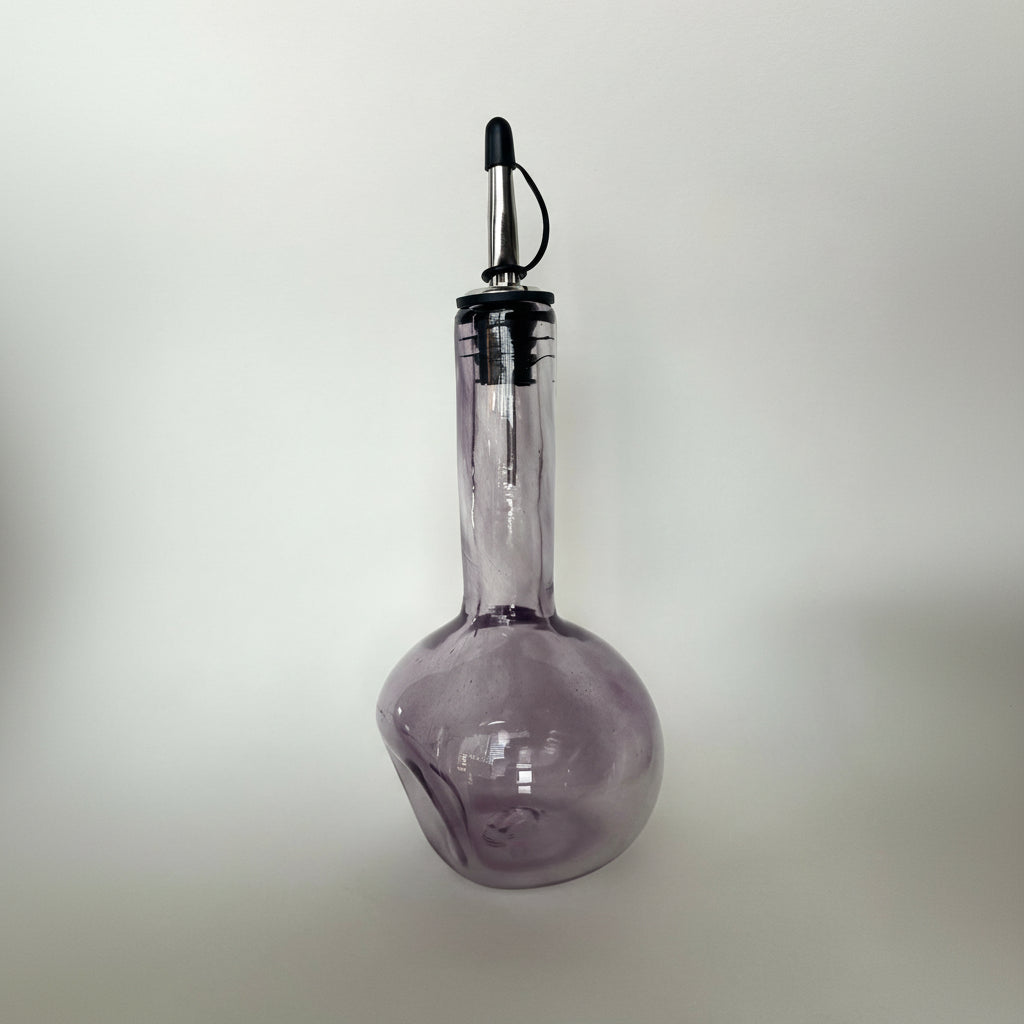 Dented oil bottle -amethyst